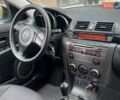 Серый Мазда 3, объемом двигателя 1.6 л и пробегом 154 тыс. км за 4450 $, фото 19 на Automoto.ua