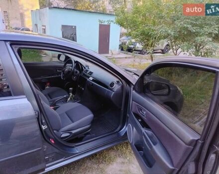 Серый Мазда 3, объемом двигателя 1.6 л и пробегом 193 тыс. км за 6000 $, фото 1 на Automoto.ua