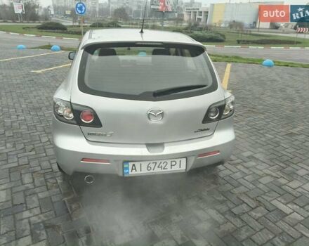 Серый Мазда 3, объемом двигателя 2 л и пробегом 250 тыс. км за 4600 $, фото 3 на Automoto.ua