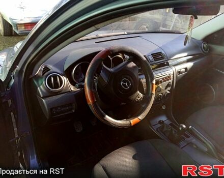 Серый Мазда 3, объемом двигателя 1.6 л и пробегом 223 тыс. км за 4800 $, фото 1 на Automoto.ua