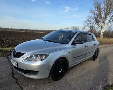 Серый Мазда 3, объемом двигателя 1.3 л и пробегом 197 тыс. км за 4600 $, фото 1 на Automoto.ua