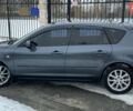 Серый Мазда 3, объемом двигателя 1.6 л и пробегом 225 тыс. км за 4777 $, фото 1 на Automoto.ua