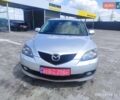 Серый Мазда 3, объемом двигателя 1.6 л и пробегом 190 тыс. км за 5800 $, фото 1 на Automoto.ua