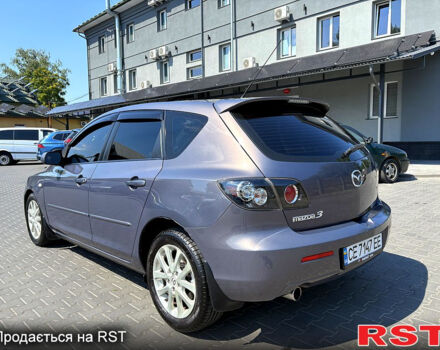 Серый Мазда 3, объемом двигателя 2 л и пробегом 205 тыс. км за 4700 $, фото 3 на Automoto.ua