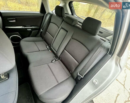 Серый Мазда 3, объемом двигателя 1.6 л и пробегом 163 тыс. км за 6250 $, фото 18 на Automoto.ua