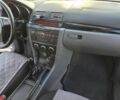 Серый Мазда 3, объемом двигателя 1.3 л и пробегом 197 тыс. км за 4600 $, фото 9 на Automoto.ua