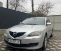 Серый Мазда 3, объемом двигателя 1.56 л и пробегом 275 тыс. км за 4600 $, фото 1 на Automoto.ua