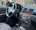 Серый Мазда 3, объемом двигателя 1.6 л и пробегом 154 тыс. км за 4450 $, фото 18 на Automoto.ua