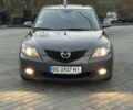 Серый Мазда 3, объемом двигателя 1.6 л и пробегом 59 тыс. км за 7000 $, фото 4 на Automoto.ua