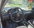 Сірий Мазда 3, об'ємом двигуна 1.56 л та пробігом 350 тис. км за 4400 $, фото 7 на Automoto.ua