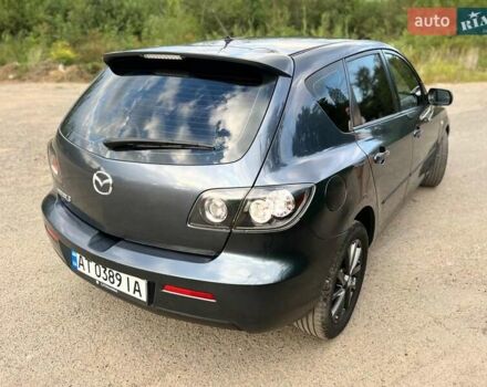 Серый Мазда 3, объемом двигателя 2 л и пробегом 242 тыс. км за 6700 $, фото 1 на Automoto.ua