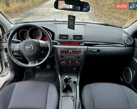 Серый Мазда 3, объемом двигателя 1.6 л и пробегом 163 тыс. км за 6250 $, фото 20 на Automoto.ua