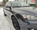 Серый Мазда 3, объемом двигателя 1.6 л и пробегом 193 тыс. км за 5750 $, фото 10 на Automoto.ua