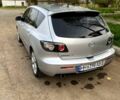 Серый Мазда 3, объемом двигателя 2 л и пробегом 230 тыс. км за 6000 $, фото 1 на Automoto.ua