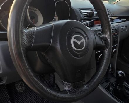 Серый Мазда 3, объемом двигателя 1.3 л и пробегом 197 тыс. км за 4600 $, фото 12 на Automoto.ua