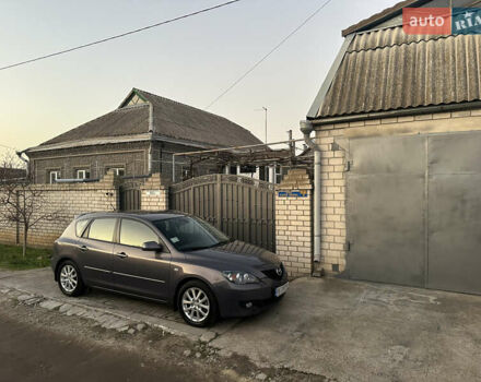 Серый Мазда 3, объемом двигателя 1.6 л и пробегом 66 тыс. км за 6999 $, фото 8 на Automoto.ua