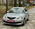 Серый Мазда 3, объемом двигателя 1.6 л и пробегом 163 тыс. км за 6250 $, фото 1 на Automoto.ua
