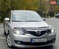 Серый Мазда 3, объемом двигателя 1.6 л и пробегом 154 тыс. км за 4450 $, фото 1 на Automoto.ua