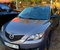 Серый Мазда 3, объемом двигателя 1.3 л и пробегом 221 тыс. км за 5000 $, фото 1 на Automoto.ua