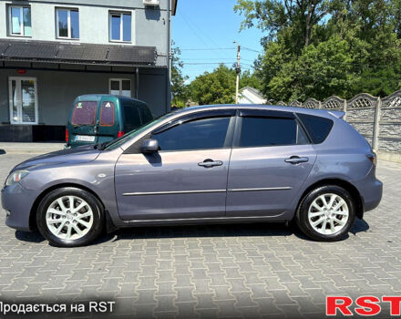 Серый Мазда 3, объемом двигателя 2 л и пробегом 205 тыс. км за 4700 $, фото 2 на Automoto.ua
