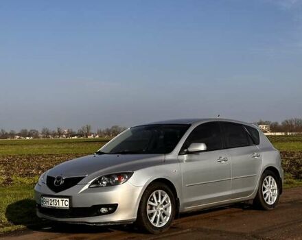 Серый Мазда 3, объемом двигателя 1.6 л и пробегом 160 тыс. км за 6000 $, фото 1 на Automoto.ua