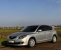 Серый Мазда 3, объемом двигателя 1.6 л и пробегом 160 тыс. км за 6000 $, фото 1 на Automoto.ua