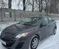 Серый Мазда 3, объемом двигателя 1.6 л и пробегом 255 тыс. км за 7000 $, фото 1 на Automoto.ua