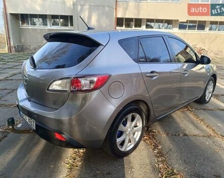 Серый Мазда 3, объемом двигателя 1.6 л и пробегом 240 тыс. км за 5999 $, фото 10 на Automoto.ua