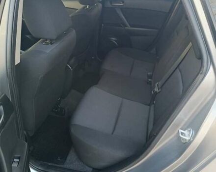 Серый Мазда 3, объемом двигателя 1.6 л и пробегом 240 тыс. км за 5999 $, фото 12 на Automoto.ua