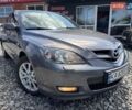Серый Мазда 3, объемом двигателя 1.6 л и пробегом 141 тыс. км за 5900 $, фото 1 на Automoto.ua