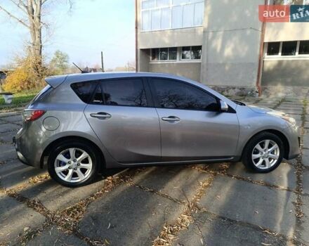 Серый Мазда 3, объемом двигателя 1.6 л и пробегом 240 тыс. км за 5999 $, фото 9 на Automoto.ua