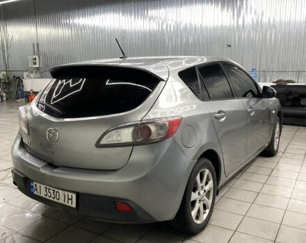 Сірий Мазда 3, об'ємом двигуна 1.56 л та пробігом 240 тис. км за 4700 $, фото 4 на Automoto.ua