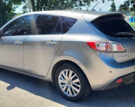 Серый Мазда 3, объемом двигателя 1.6 л и пробегом 180 тыс. км за 6600 $, фото 1 на Automoto.ua