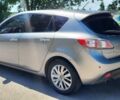Серый Мазда 3, объемом двигателя 1.6 л и пробегом 180 тыс. км за 6600 $, фото 1 на Automoto.ua