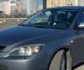 Сірий Мазда 3, об'ємом двигуна 2 л та пробігом 300 тис. км за 6400 $, фото 2 на Automoto.ua