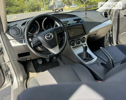Сірий Мазда 3, об'ємом двигуна 2.18 л та пробігом 206 тис. км за 6999 $, фото 24 на Automoto.ua