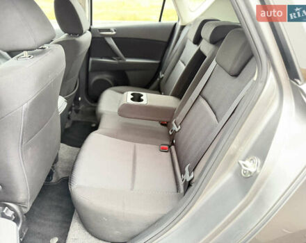 Серый Мазда 3, объемом двигателя 1.6 л и пробегом 75 тыс. км за 8750 $, фото 84 на Automoto.ua