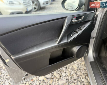 Серый Мазда 3, объемом двигателя 1.6 л и пробегом 229 тыс. км за 6750 $, фото 21 на Automoto.ua