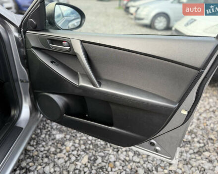 Серый Мазда 3, объемом двигателя 1.6 л и пробегом 229 тыс. км за 6750 $, фото 22 на Automoto.ua