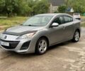 Серый Мазда 3, объемом двигателя 2 л и пробегом 234 тыс. км за 6300 $, фото 1 на Automoto.ua