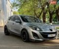 Сірий Мазда 3, об'ємом двигуна 2.2 л та пробігом 220 тис. км за 6499 $, фото 1 на Automoto.ua
