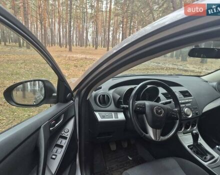 Серый Мазда 3, объемом двигателя 1.6 л и пробегом 190 тыс. км за 7000 $, фото 1 на Automoto.ua
