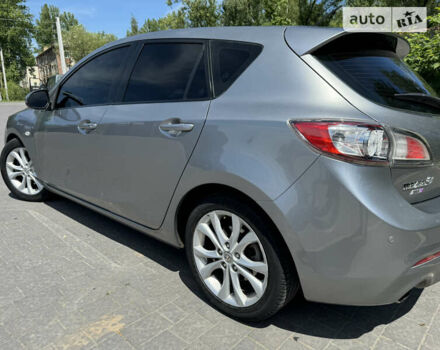 Сірий Мазда 3, об'ємом двигуна 2.18 л та пробігом 206 тис. км за 6999 $, фото 3 на Automoto.ua