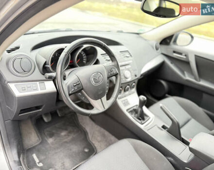 Серый Мазда 3, объемом двигателя 1.6 л и пробегом 75 тыс. км за 8750 $, фото 88 на Automoto.ua