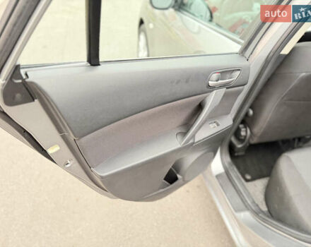 Серый Мазда 3, объемом двигателя 1.6 л и пробегом 75 тыс. км за 8750 $, фото 85 на Automoto.ua