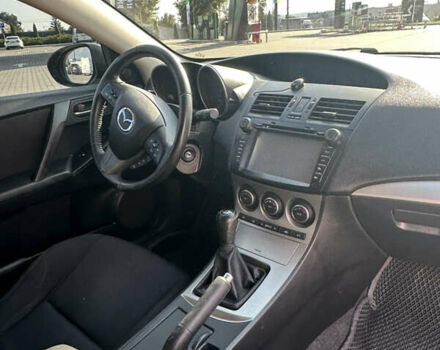 Серый Мазда 3, объемом двигателя 1.6 л и пробегом 176 тыс. км за 7300 $, фото 11 на Automoto.ua