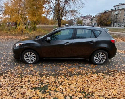 Серый Мазда 3, объемом двигателя 2 л и пробегом 195 тыс. км за 7200 $, фото 3 на Automoto.ua