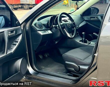 Серый Мазда 3, объемом двигателя 1.6 л и пробегом 210 тыс. км за 7300 $, фото 6 на Automoto.ua