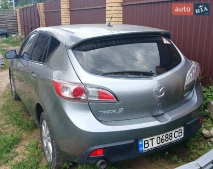 Серый Мазда 3, объемом двигателя 2 л и пробегом 82 тыс. км за 7300 $, фото 1 на Automoto.ua