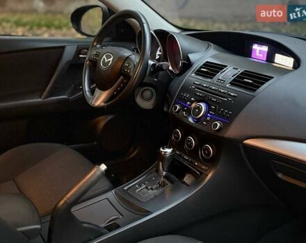 Серый Мазда 3, объемом двигателя 2 л и пробегом 160 тыс. км за 8699 $, фото 16 на Automoto.ua